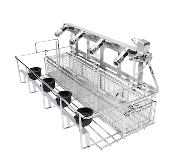Stainless steel industrial wash rack with wire baskets, multiple spray nozzles, and side holders for parts cleaning.